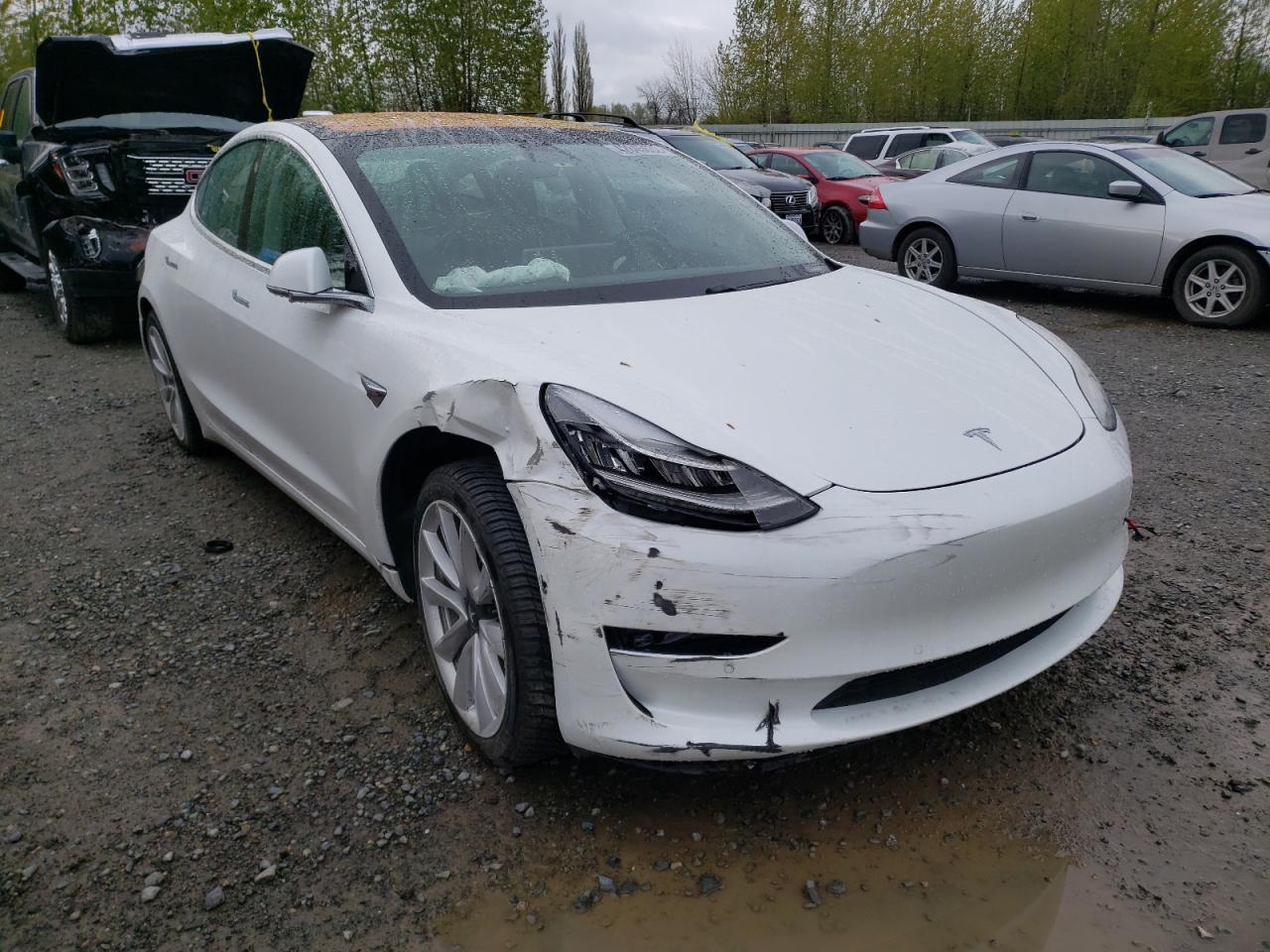 TESLA MODEL 3 2017 with VIN 5YJ3E1EA3HF002098 - Photo from auction