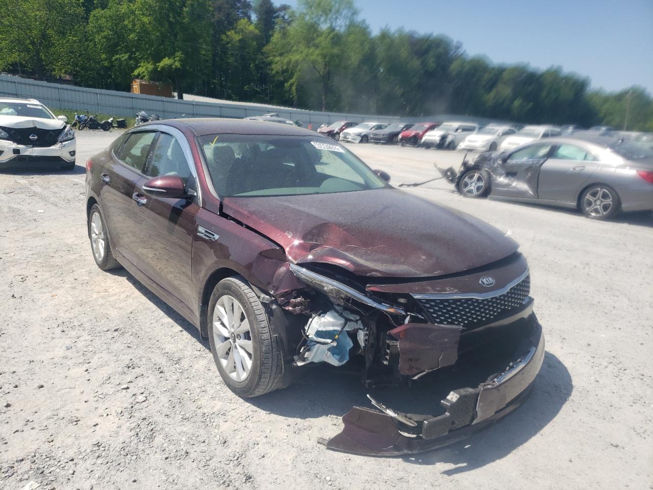 KIA OPTIMA EX 2016 with VIN 5XXGU4L36GG084110 - Photo from auction