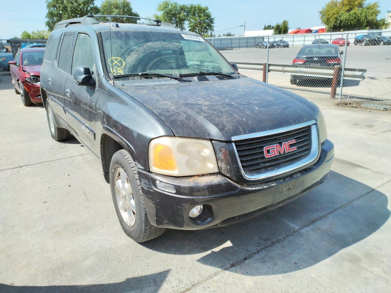 GMC ENVOY XL 2005 with VIN 1GKET16S056123205 - Photo from auction