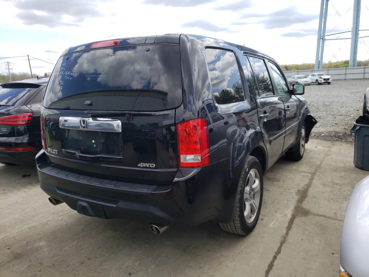 Фото 14 с аукциона – 2014 HONDA PILOT EXL с VIN 5FNYF4H52EB044079