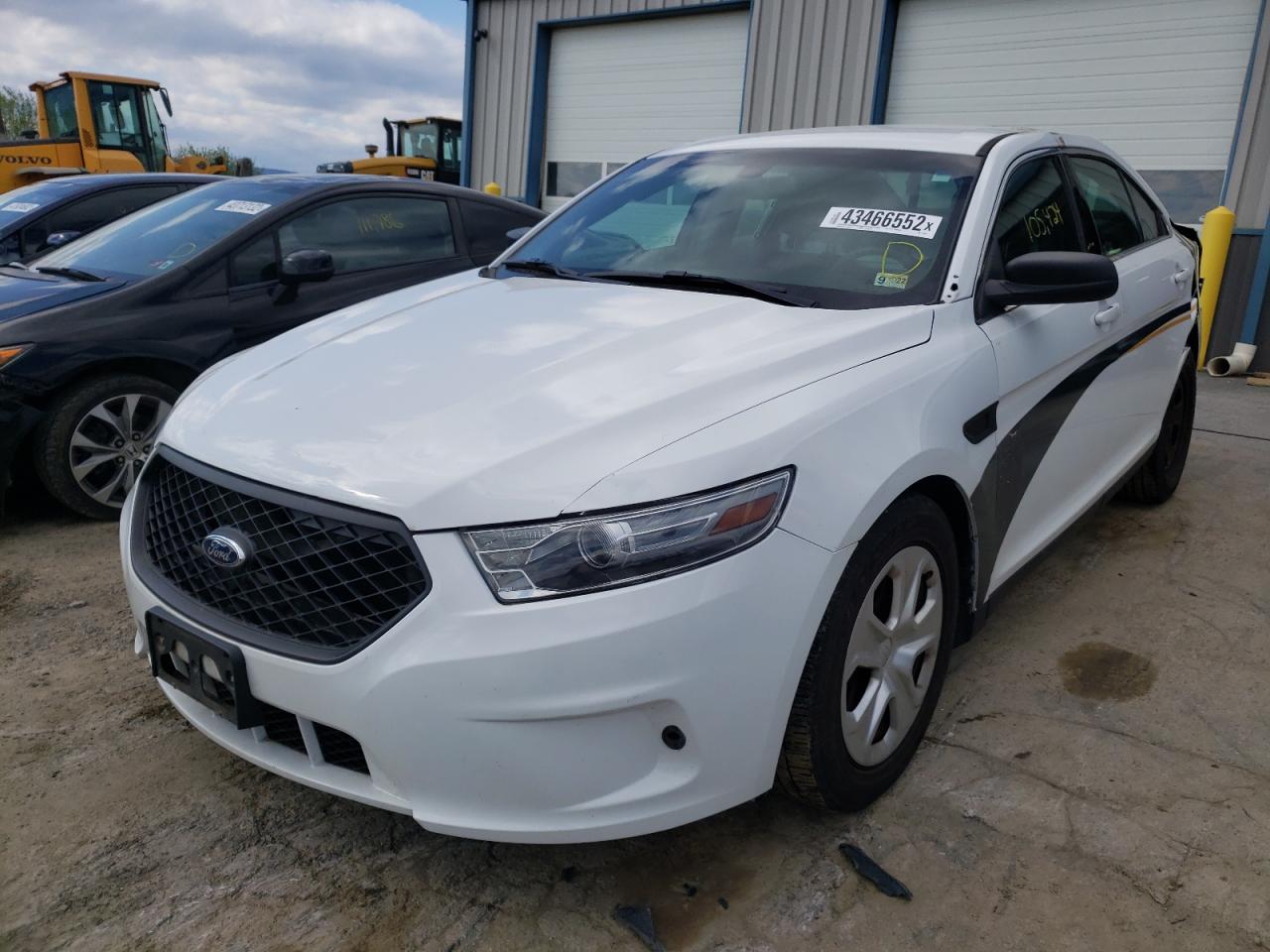 Foto 2 de la subasta – 2014 FORD TAURUS POL con VIN 1FAHP2MKXEG125985