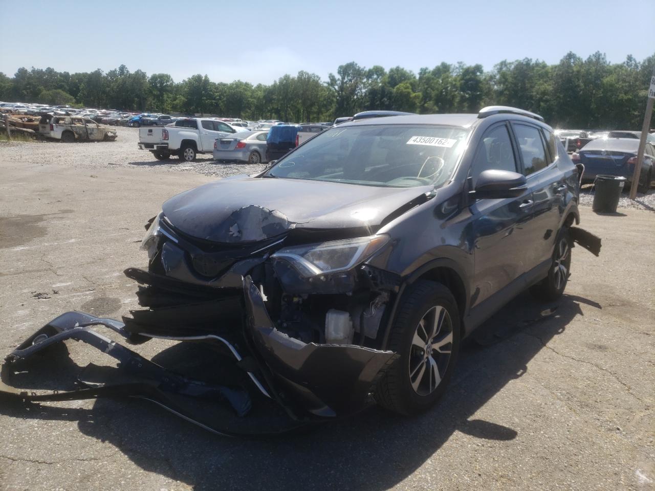 Photo 2 from auction – 2016 TOYOTA RAV4 XLE with VIN JTMWFREV7GJ100585