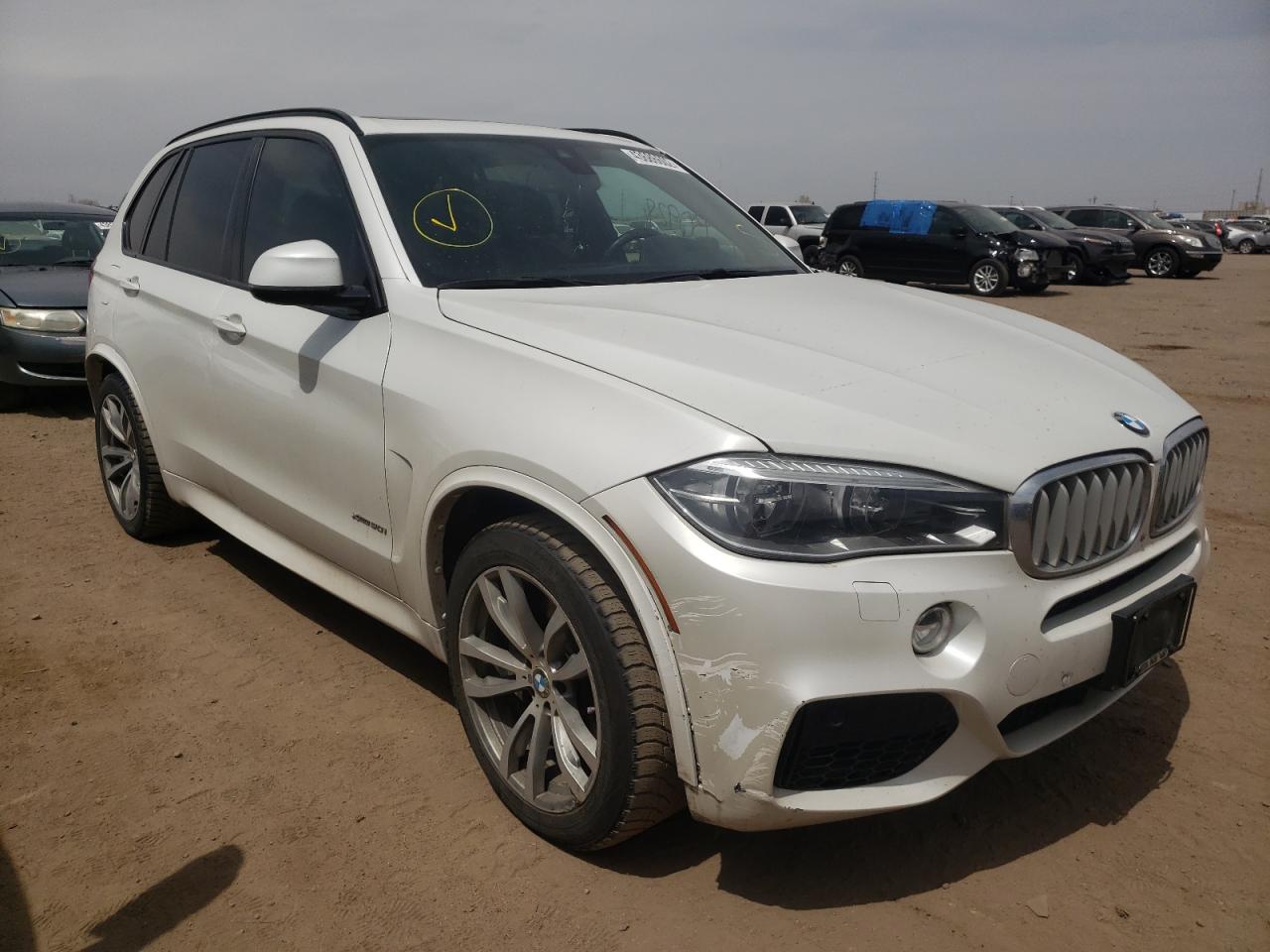 BMW X5 XDRIVE5 2014 with VIN 5UXKR6C50E0J71619 - Photo from auction
