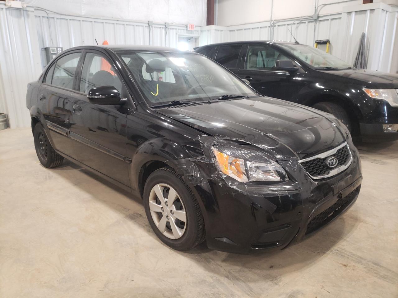 KIA RIO BASE 2011 with VIN KNADH4A30B6750358 - Photo from auction