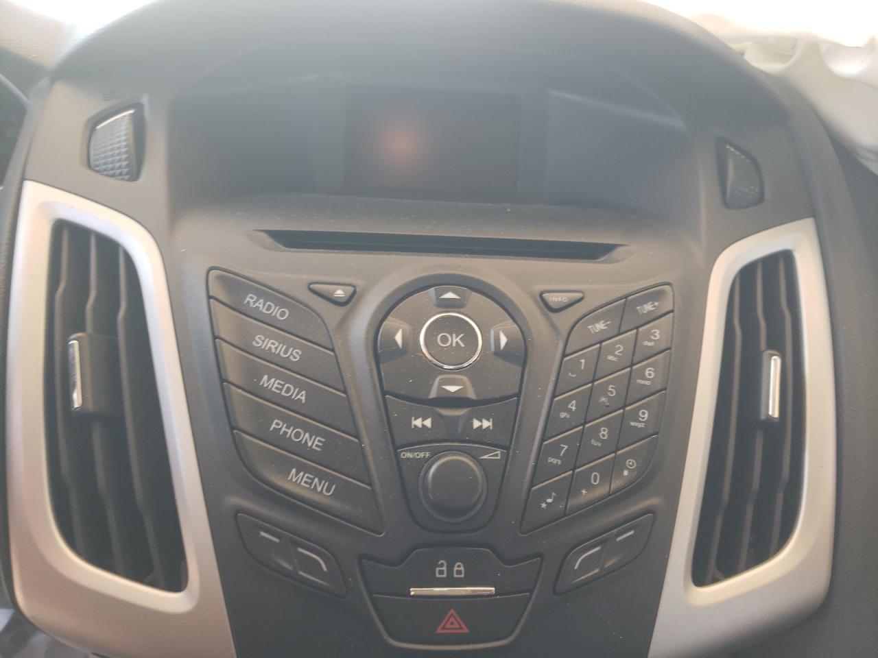 Photo 9 from auction – 2014 FORD FOCUS with VIN 1FADP3K23EL452288