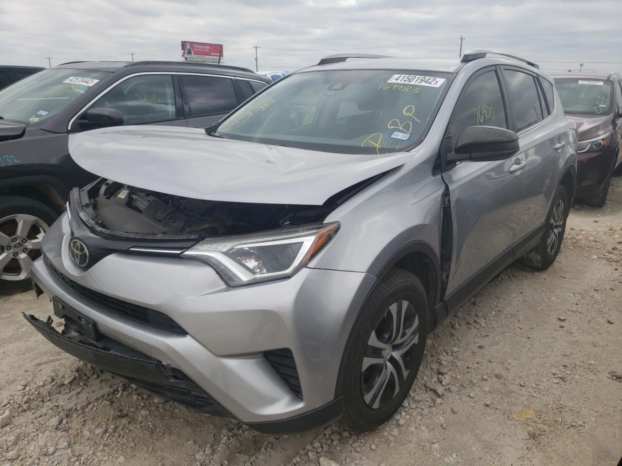 Photo 2 from auction – 2018 TOYOTA RAV4 LE with VIN JTMZFREV6JJ169983