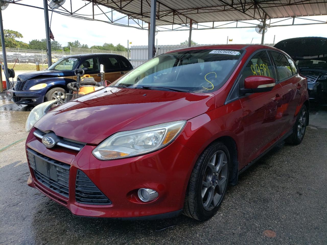 Photo 2 from auction – 2013 FORD FOCUS SE with VIN 1FADP3K2XDL294532