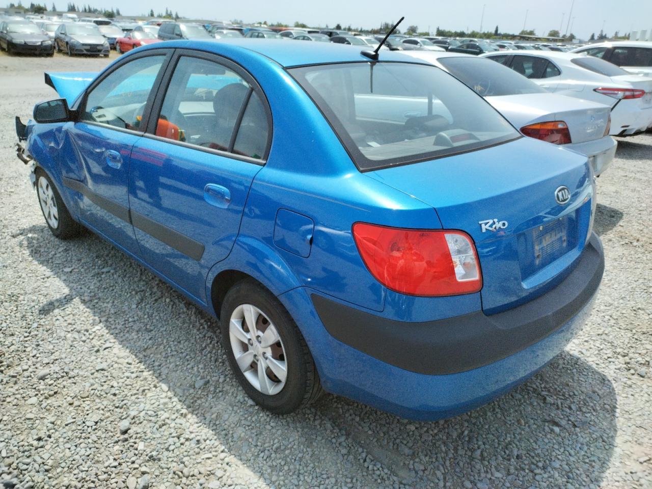 Photo 3 from auction – 2009 KIA RIO BASE with VIN KNADE223896567599
