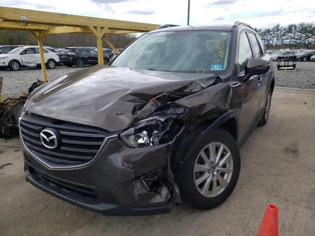 Photo 2 from auction – 2016 MAZDA CX-5 TOURI with VIN JM3KE4CY1G0643574