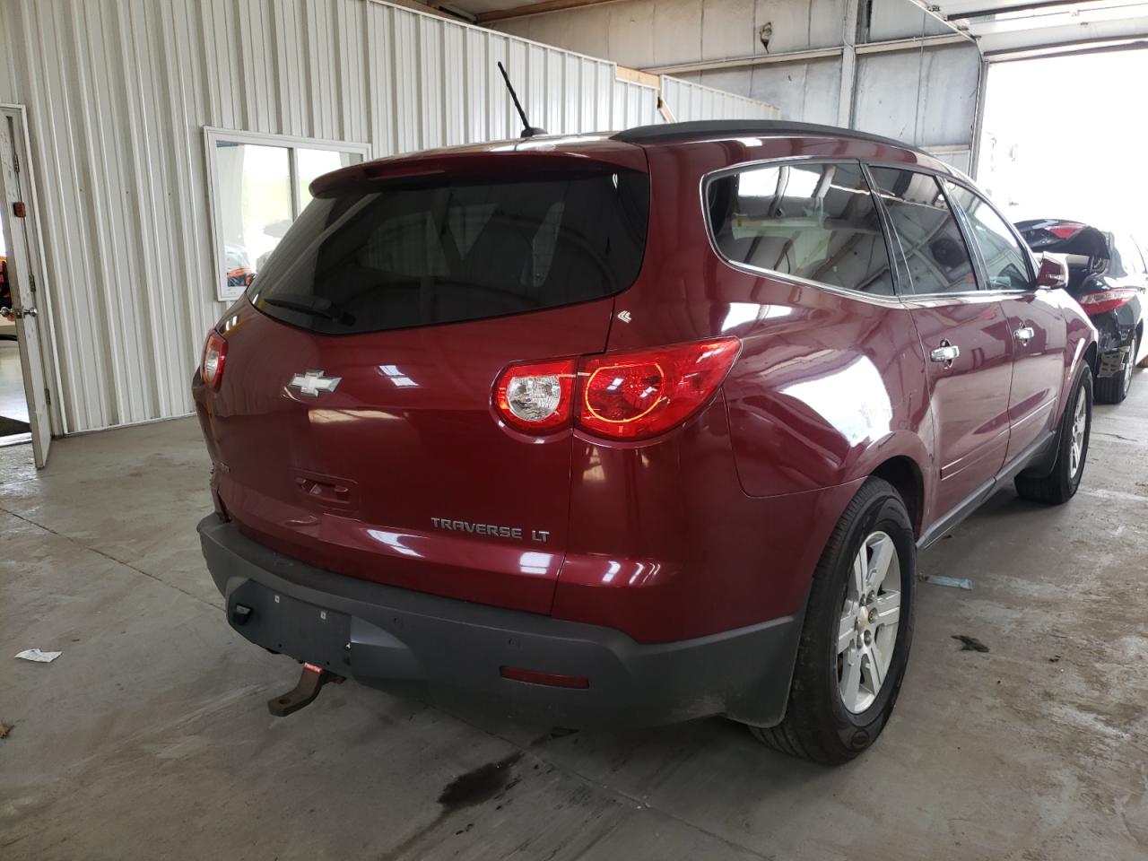 Photo 4 from auction – 2010 CHEVROLET TRAVERSE L with VIN 1GNLVFED1AS149480