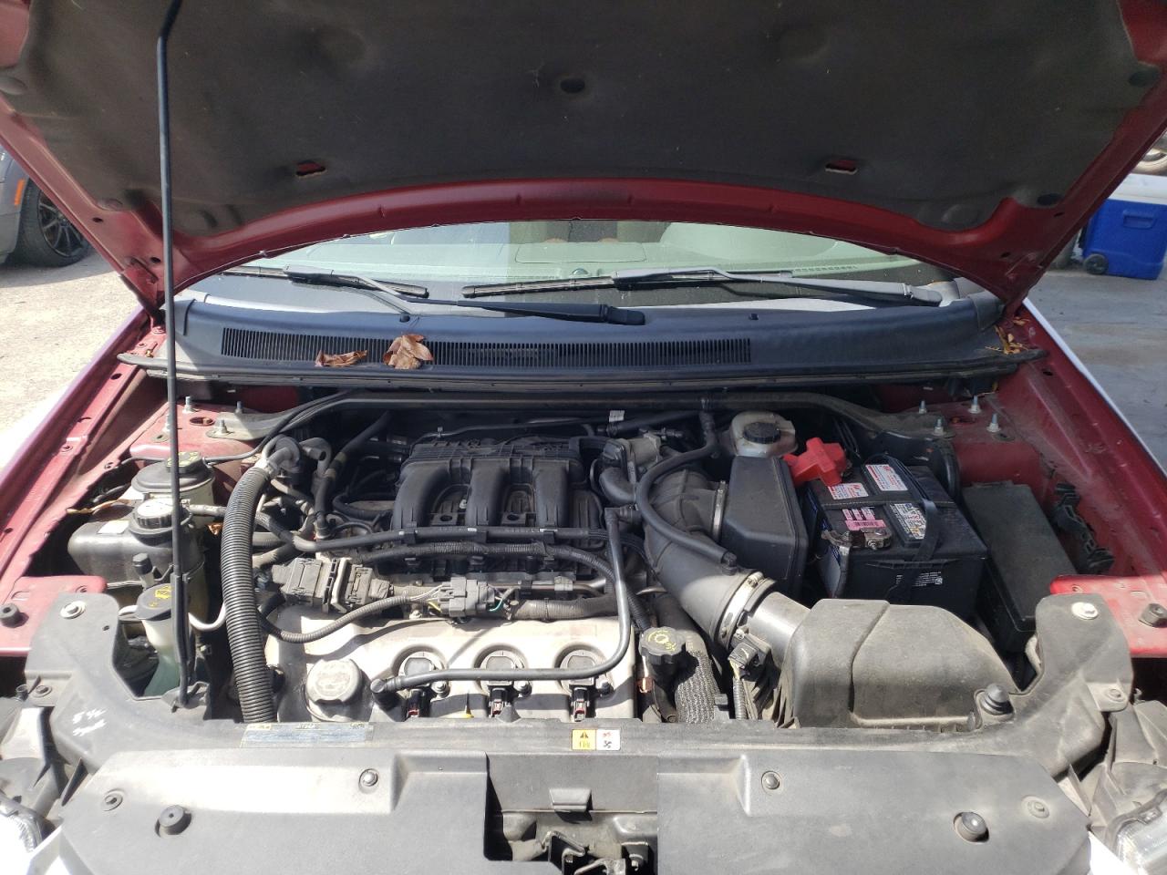 Photo 7 from auction – 2008 FORD TAURUS X L with VIN 1FMDK06W18GA22174