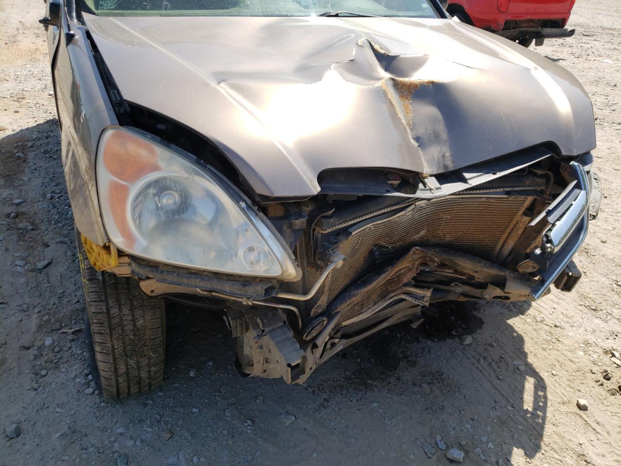 Photo 9 from auction – 2004 HONDA CR-V LX with VIN JHLRD68464C008911