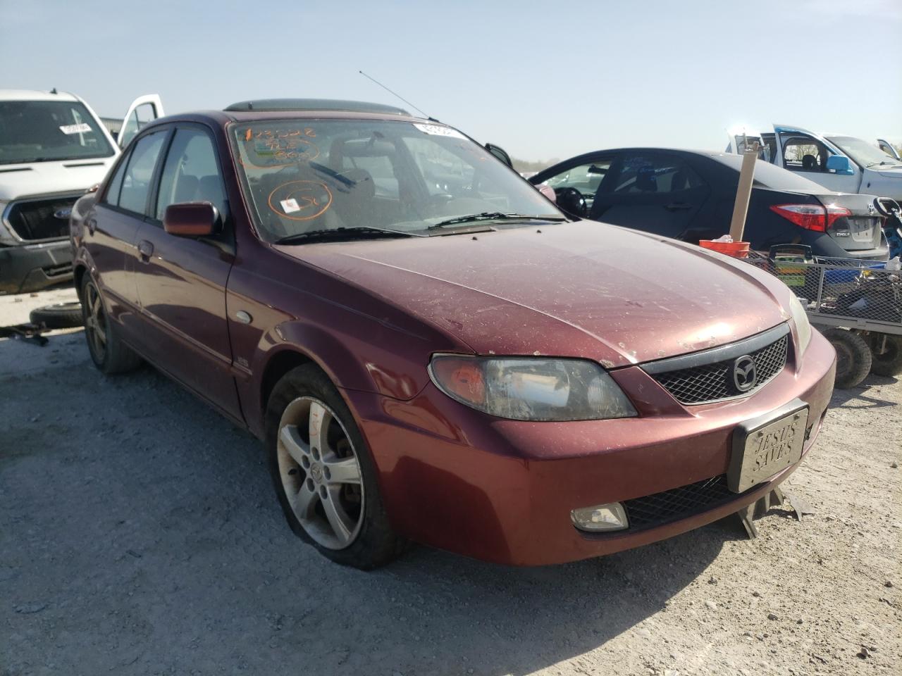 MAZDA PROTEGE DX 2003 with VIN JM1BJ226631123528 - Photo from auction