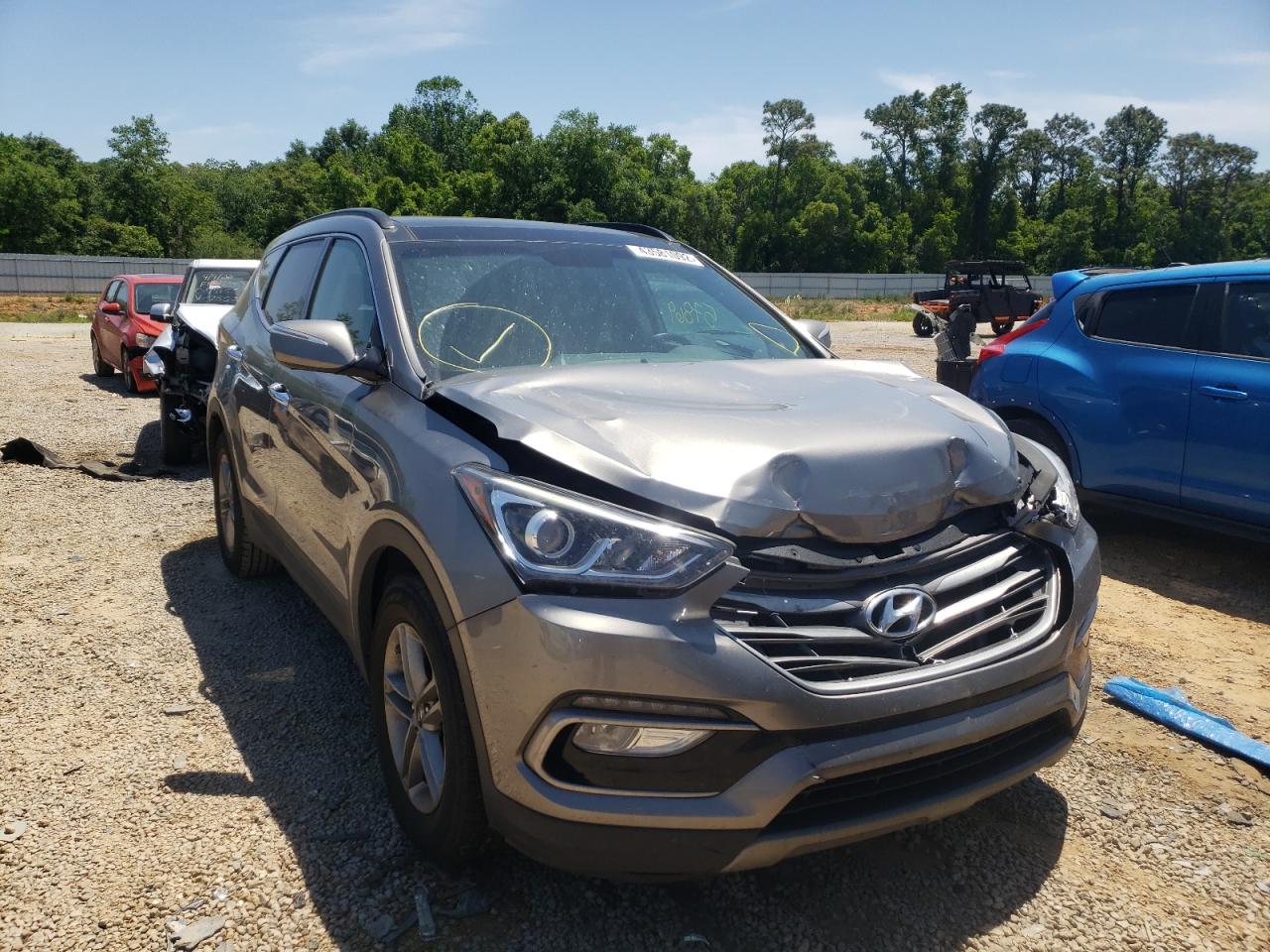 HYUNDAI SANTA FE S 2017 with VIN 5NMZU3LB7HH037486 - Photo from auction