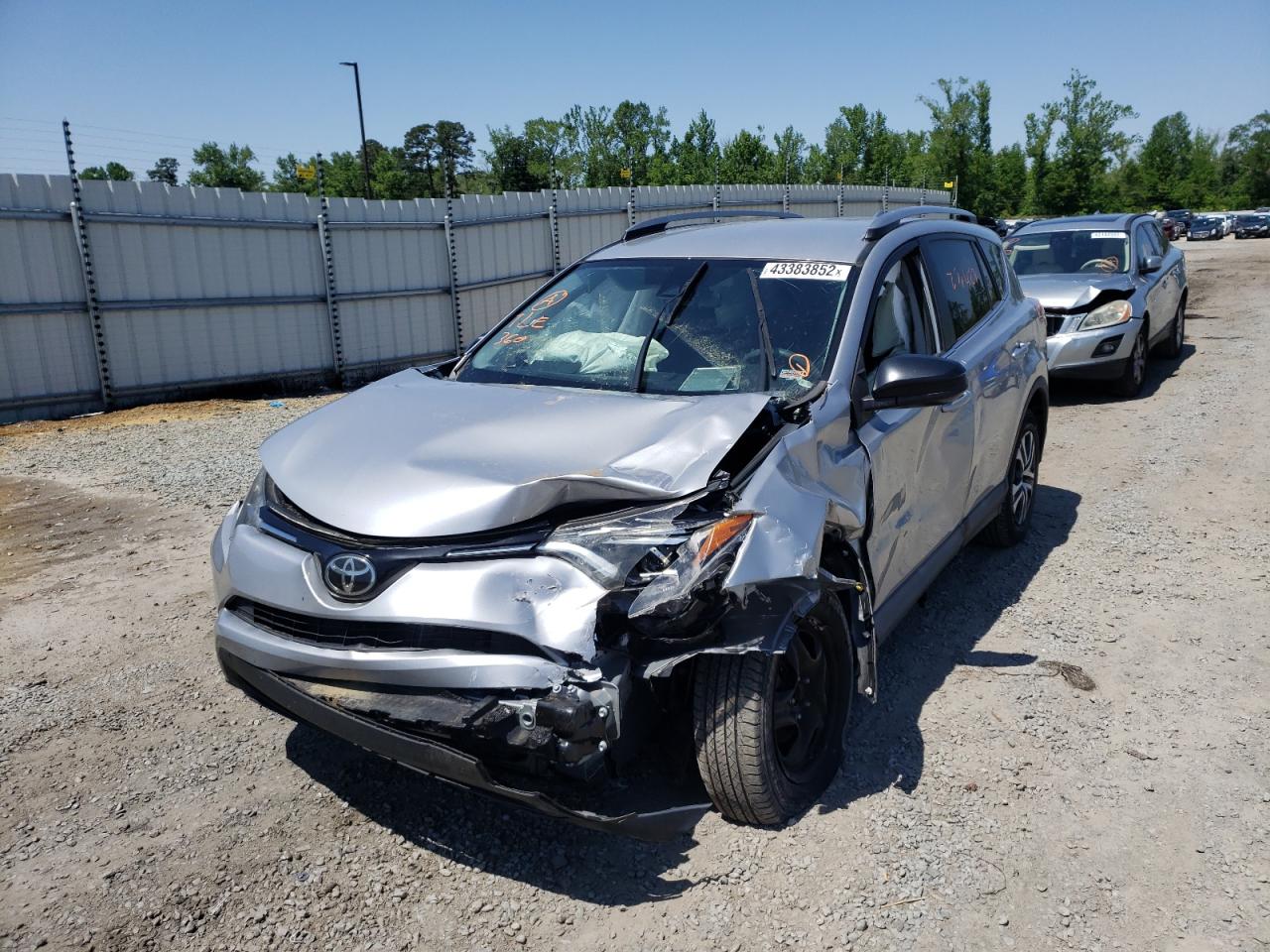 Photo 2 from auction – 2018 TOYOTA RAV4 LE with VIN 2T3ZFREV1JW454351