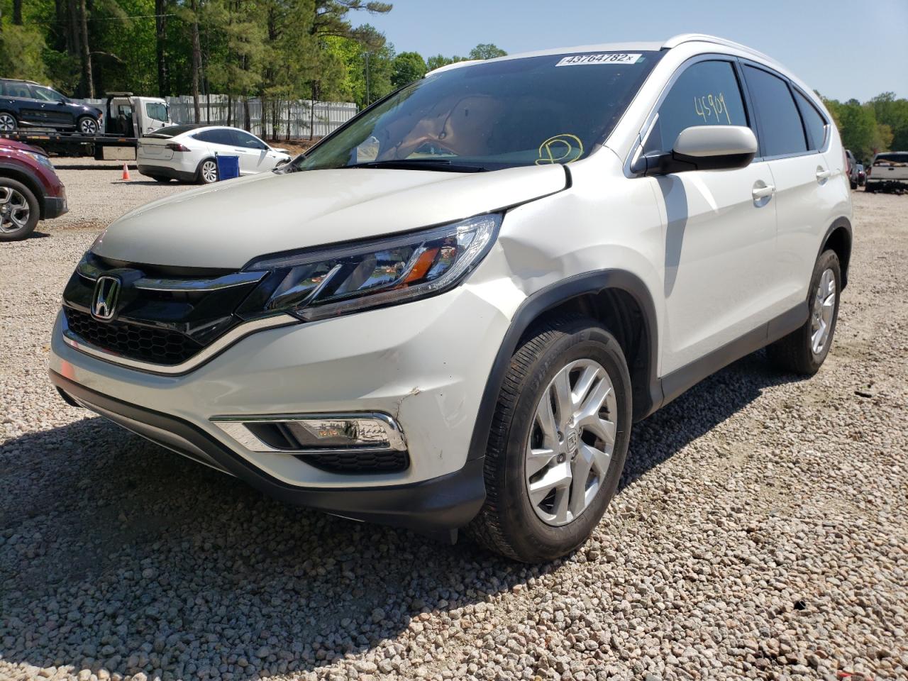 Photo 2 from auction – 2016 HONDA CR-V EXL with VIN 5J6RM4H72GL052575