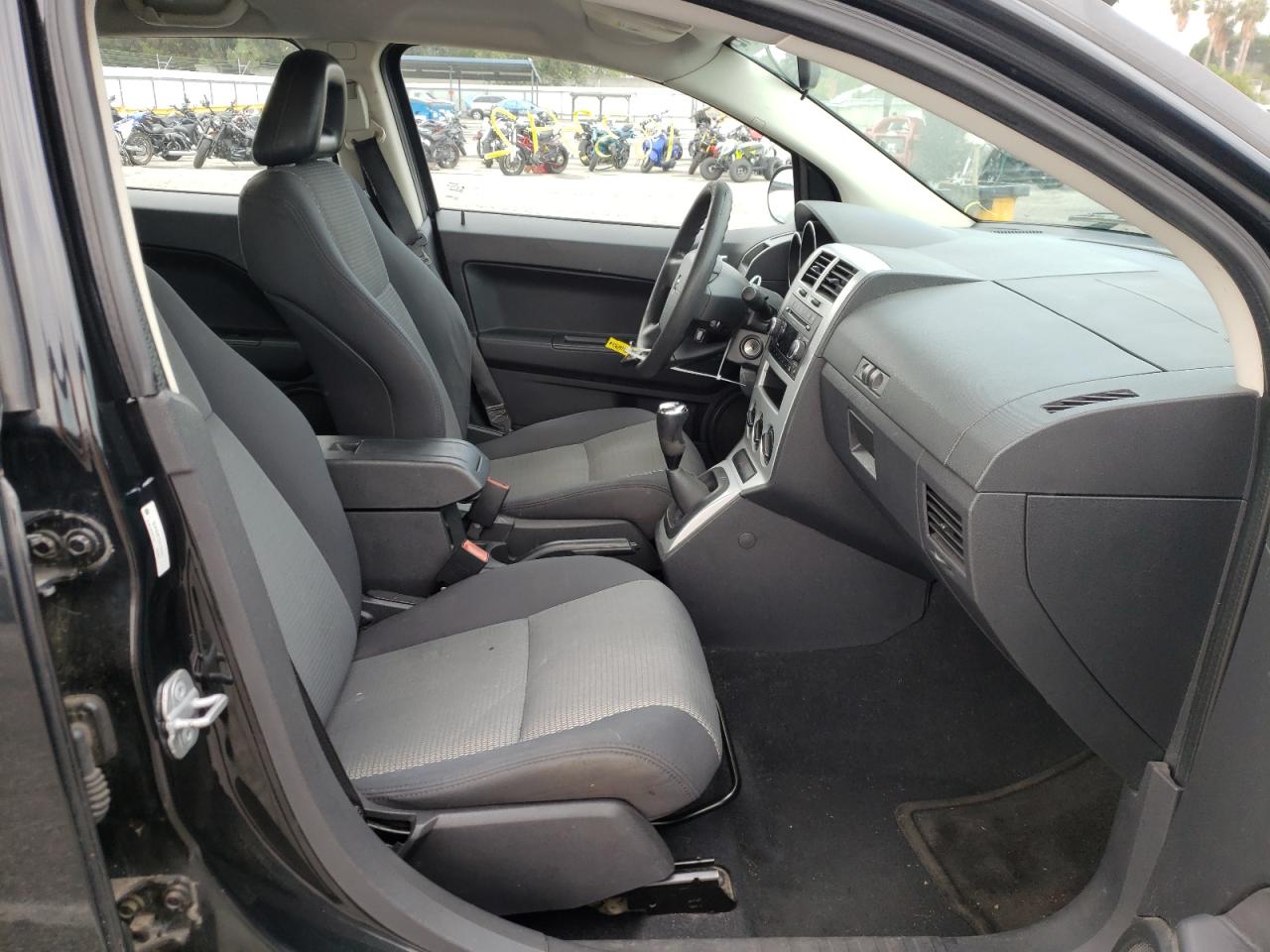 Photo 5 from auction – 2009 DODGE CALIBER SX with VIN 1B3HB48C29D104693