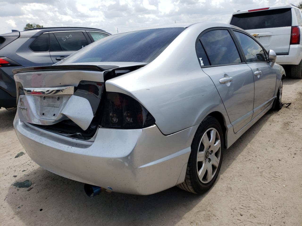 Photo 4 from auction – 2011 HONDA CIVIC LX with VIN 19XFA1F5XBE027751