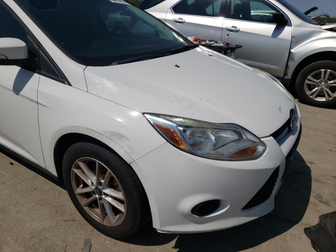 Photo 9 from auction – 2013 FORD FOCUS SE with VIN 1FADP3F22DL339974