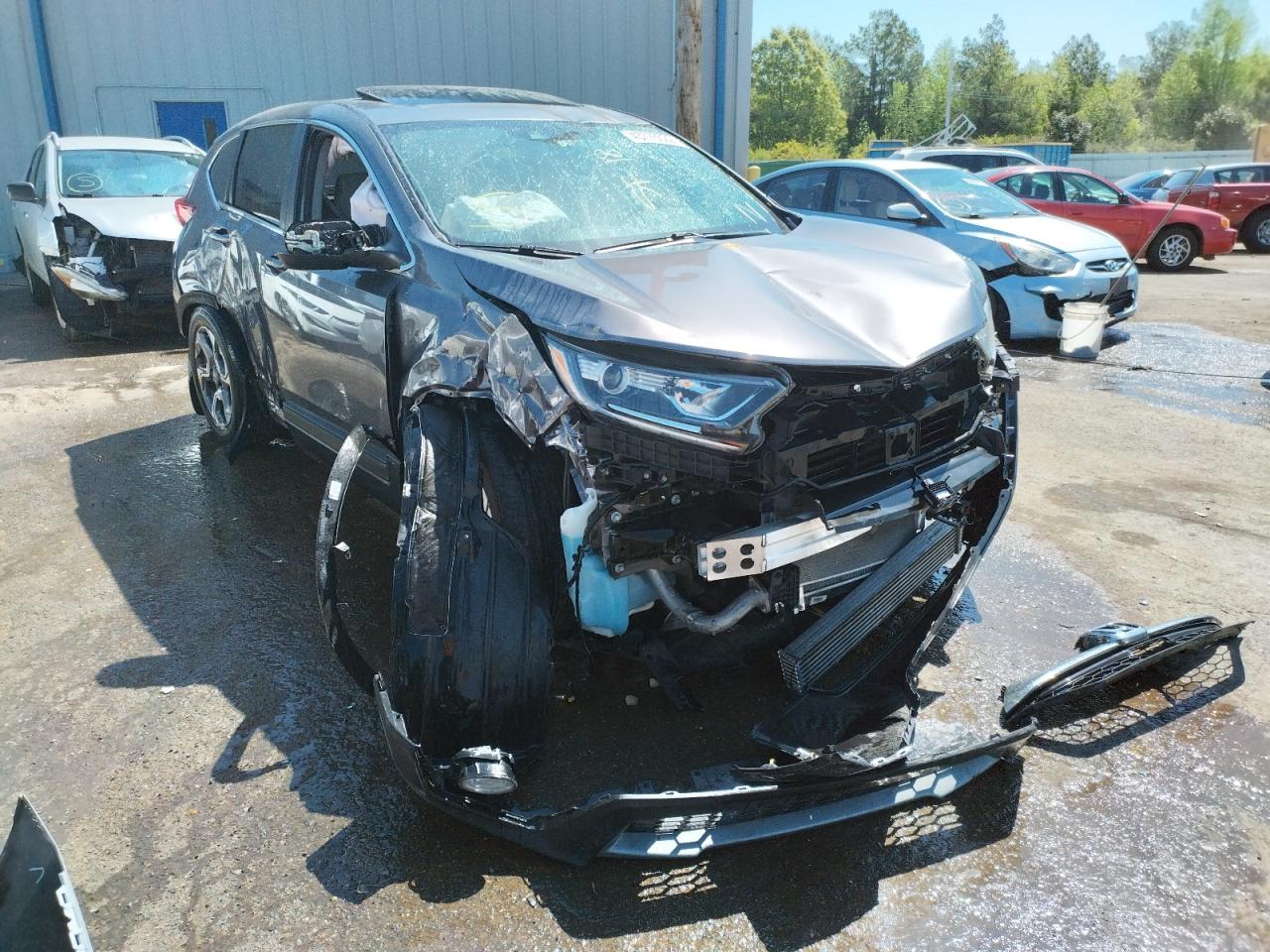 HONDA CR-V EX 2018 with VIN 7FARW2H56JE084933 - Photo from auction