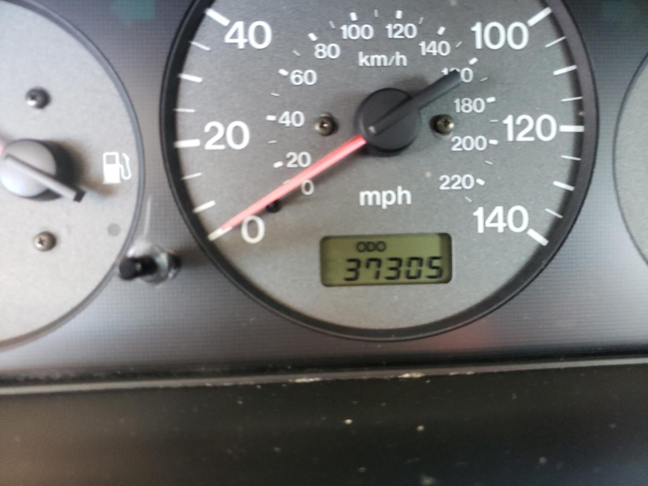 Photo 8 from auction – 1999 MAZDA PROTEGE DX with VIN JM1BJ2229X0130532