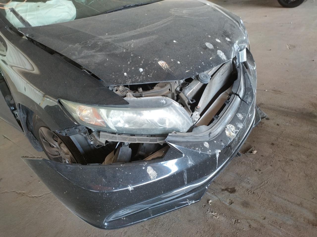 Photo 20 from auction – 2015 HONDA CIVIC LX with VIN 19XFB2F50FE119749