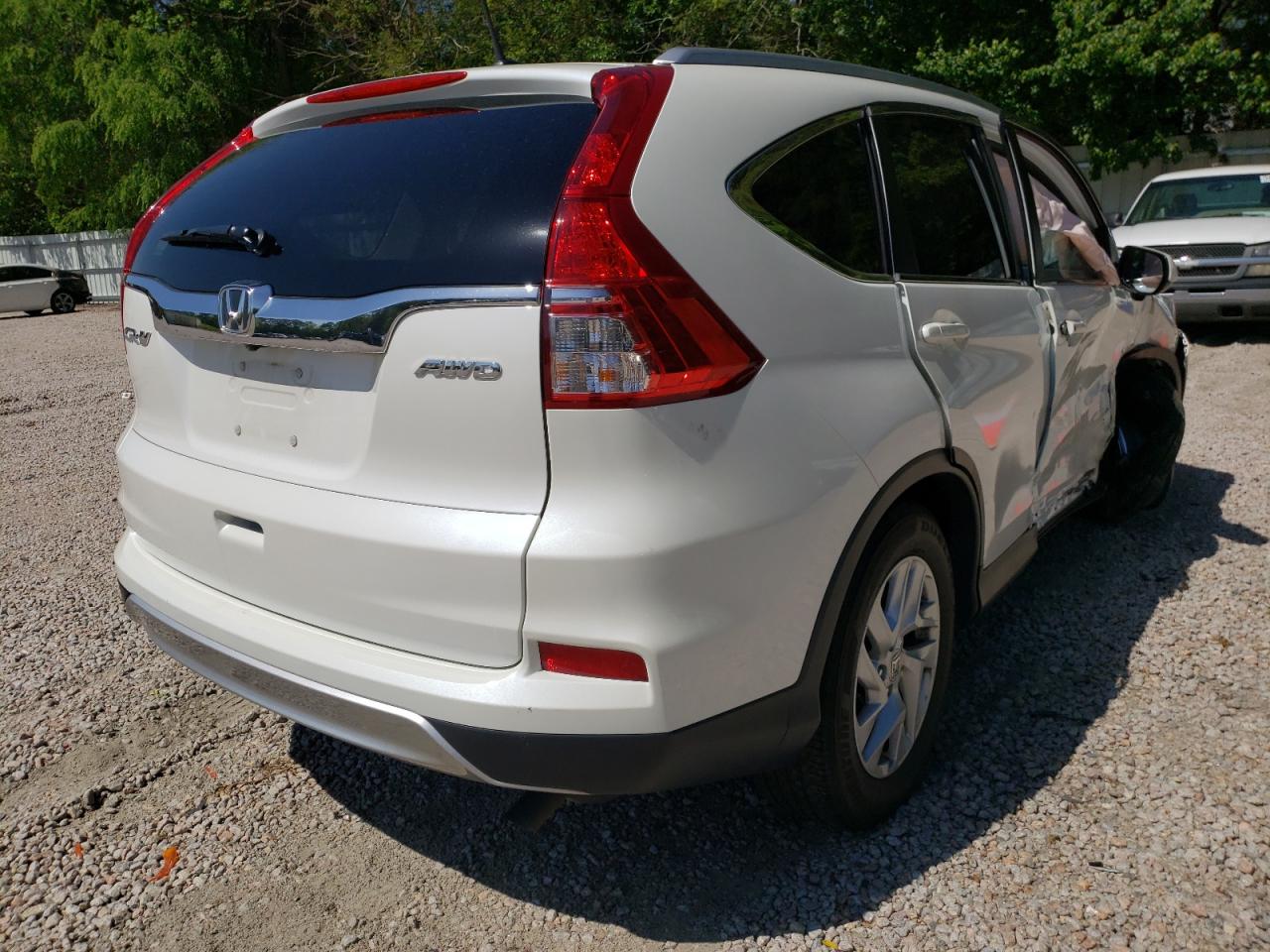 Photo 4 from auction – 2016 HONDA CR-V EXL with VIN 5J6RM4H72GL052575