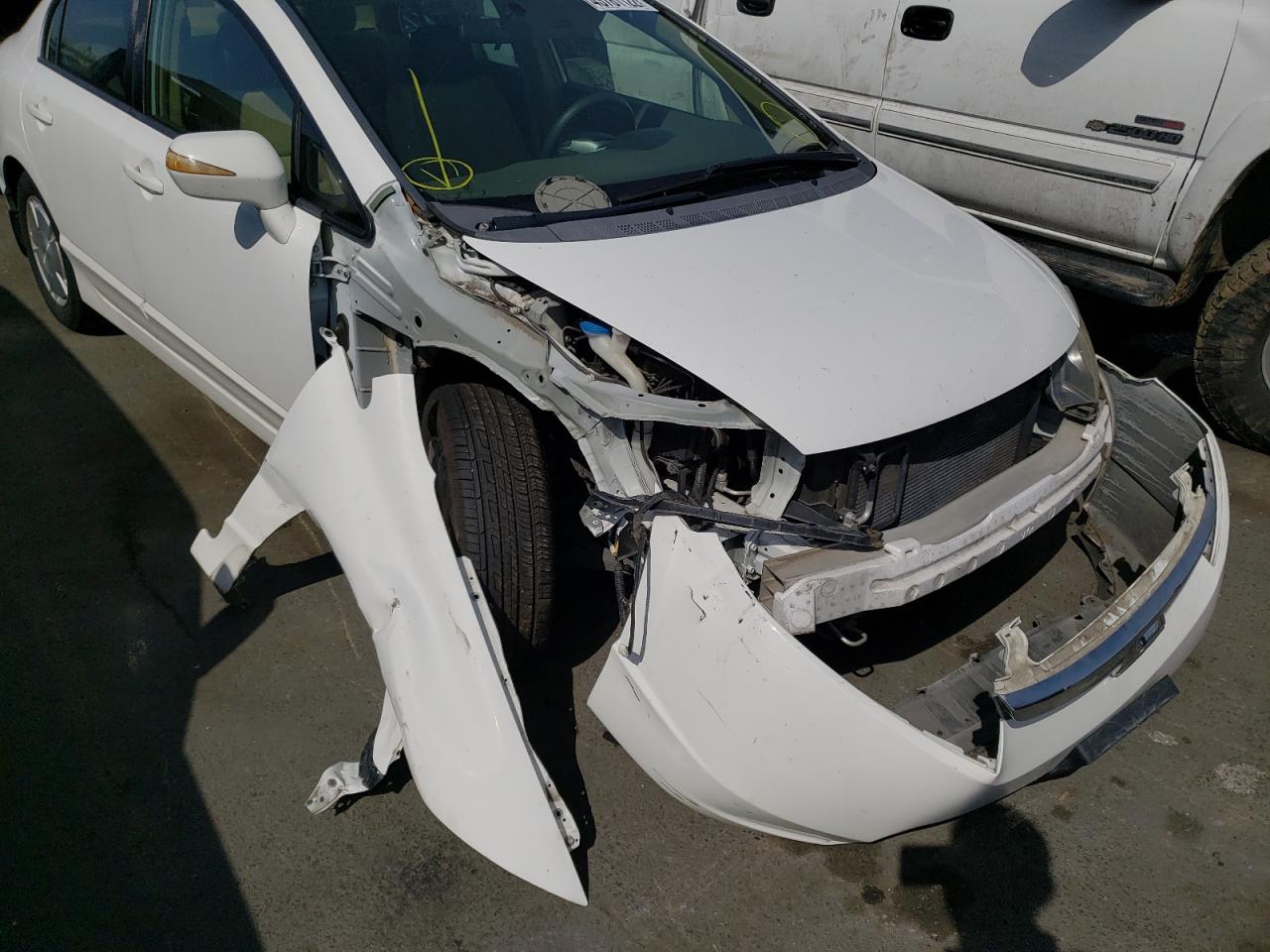 Photo 20 from auction – 2007 HONDA CIVIC HYBR with VIN JHMFA36267S025631