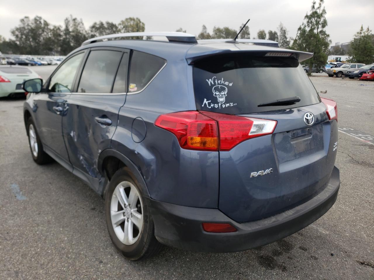 Photo 3 from auction – 2014 TOYOTA RAV4 XLE with VIN JTMRFREV2ED088726
