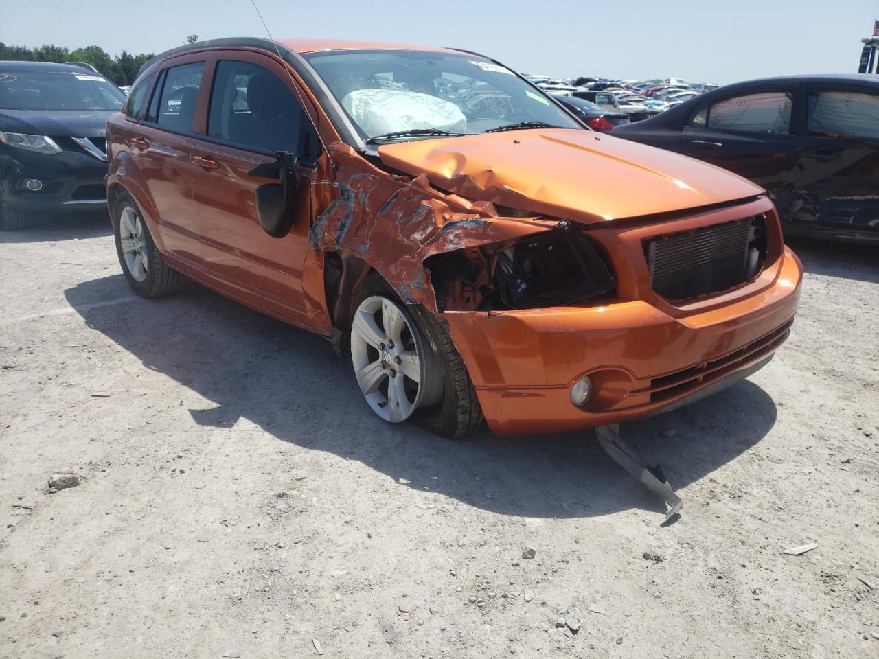 DODGE CALIBER MA 2011 with VIN 1B3CB3HA3BD166726 - Photo from auction