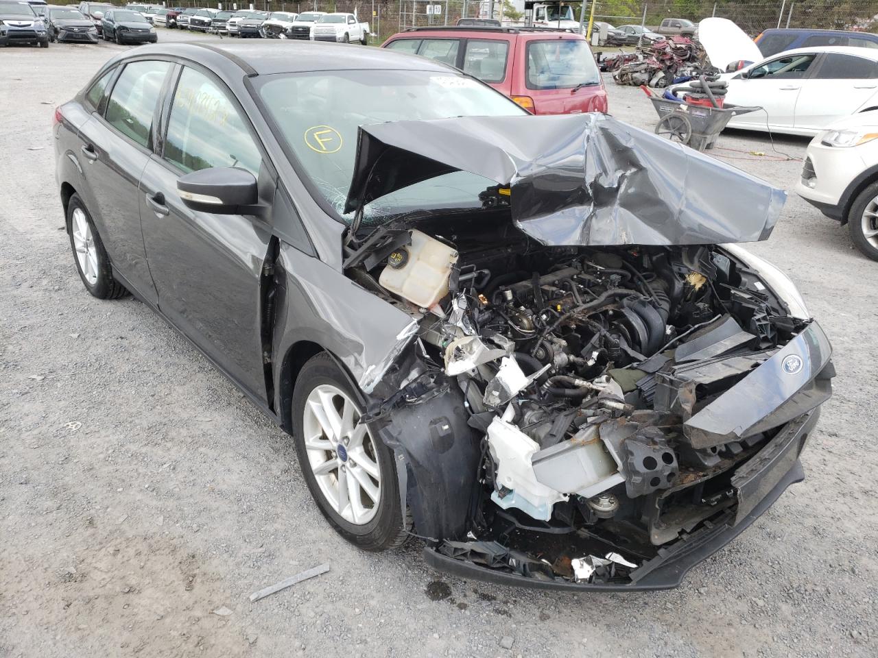 FORD FOCUS SE 2015 with VIN 1FADP3F2XFL355021 - Photo from auction