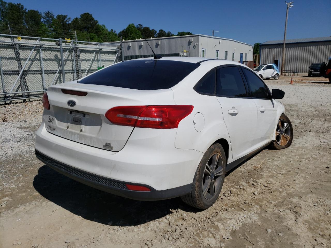 Photo 4 from auction – 2018 FORD FOCUS SE with VIN 1FADP3FE7JL307320