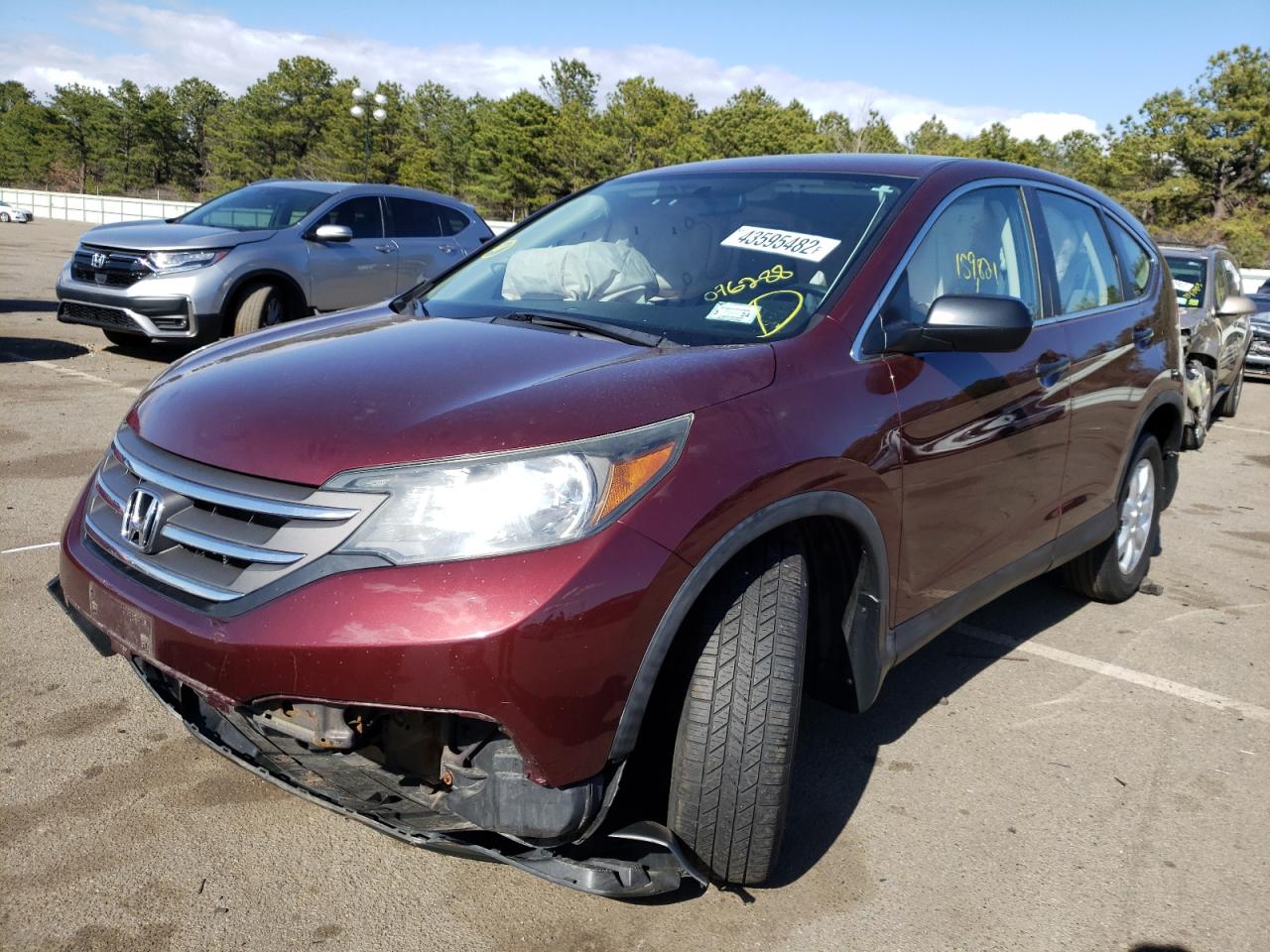 Photo 2 from auction – 2012 HONDA CR-V LX with VIN 5J6RM4H3XCL076288