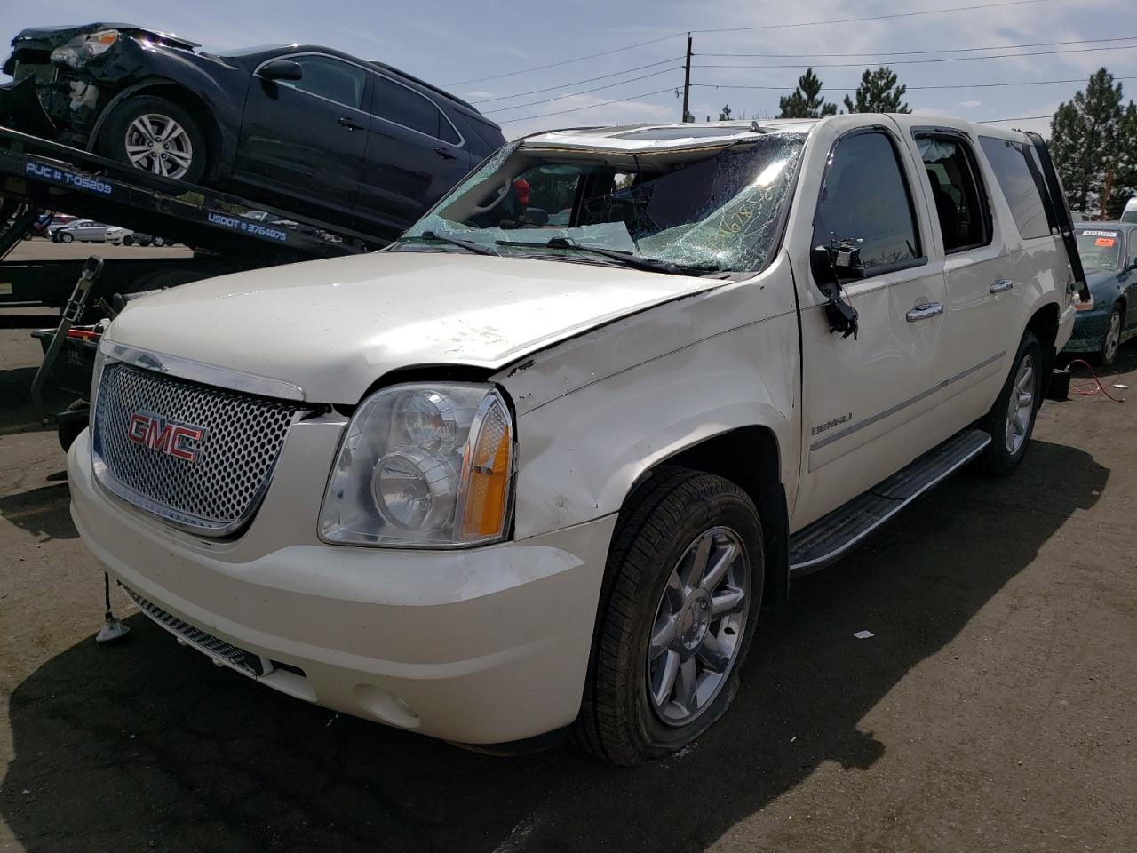 Photo 2 from auction – 2011 GMC YUKON XL D with VIN 1GKS2MEF9BR265347