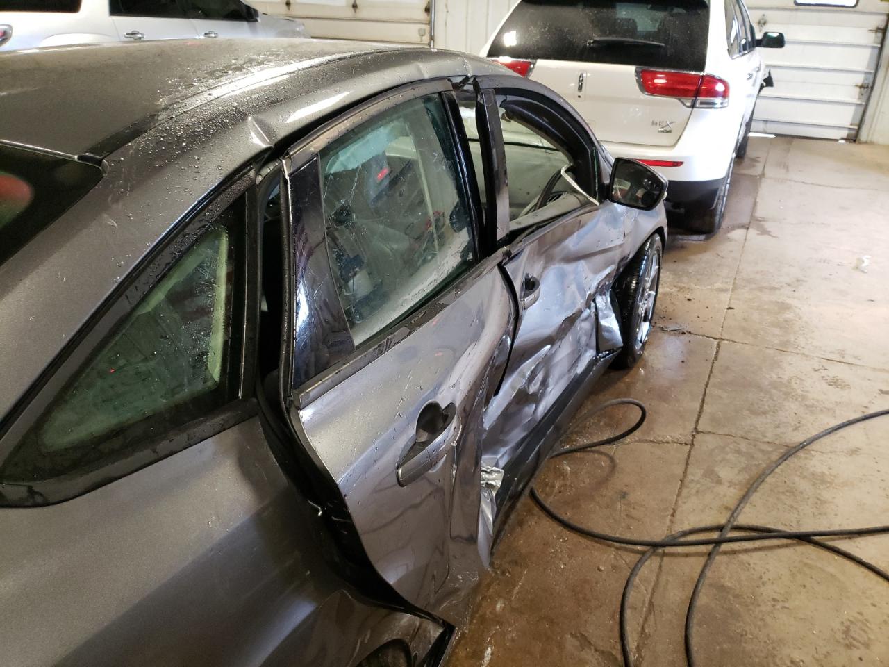Photo 9 from auction – 2014 FORD FOCUS SE with VIN 1FADP3F22EL429434