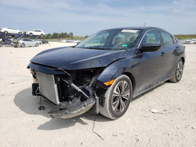 Photo 2 from auction – 2016 HONDA CIVIC LX with VIN 19XFC2F5XGE053869