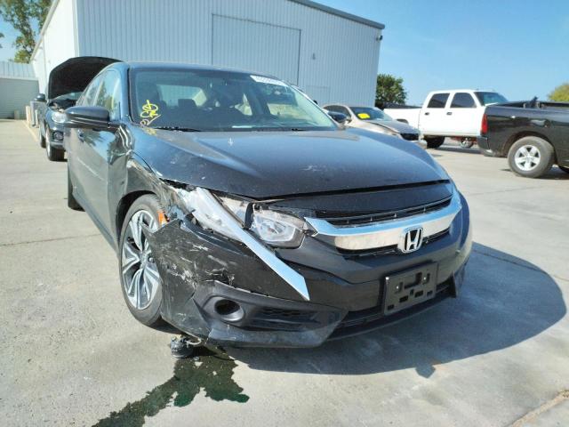HONDA CIVIC EX 2018 with VIN JHMFC1F31JX025117 - Photo from auction