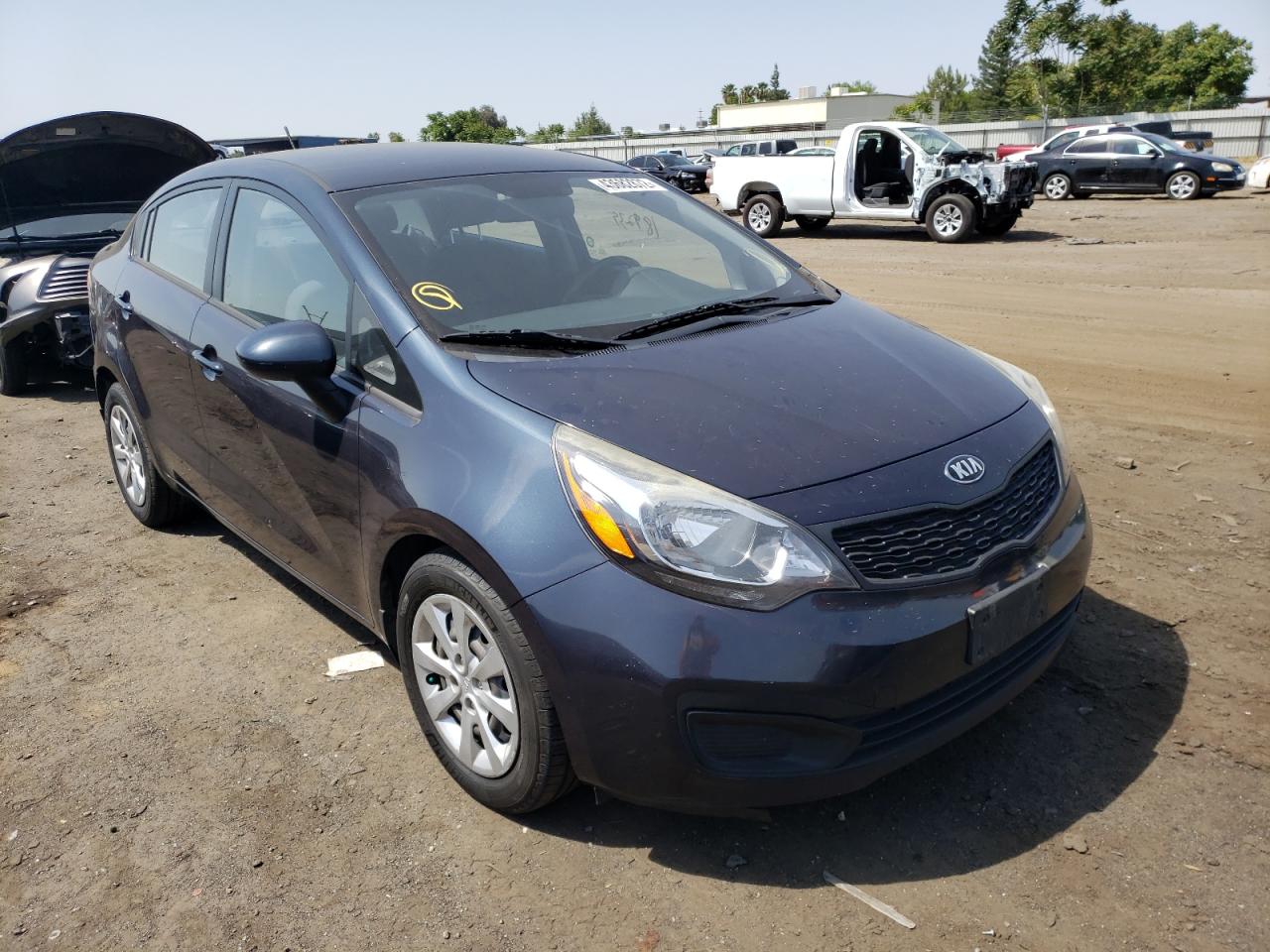 KIA RIO LX 2014 with VIN KNADM4A31E6330401 - Photo from auction