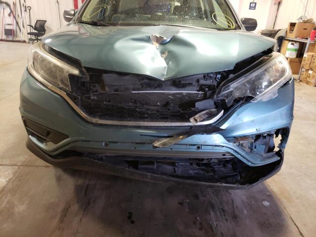 Photo 9 from auction – 2015 HONDA CR-V LX with VIN 5J6RM4H35FL059015