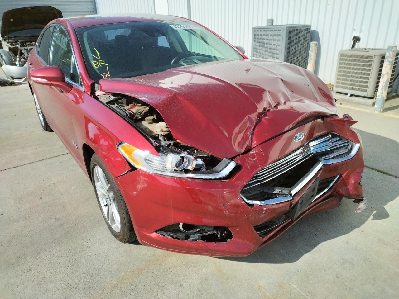 FORD FUSION TIT 2016 with VIN 3FA6P0SU0GR157615 - Photo from auction