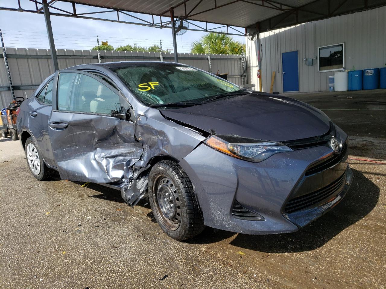 TOYOTA COROLLA L 2019 with VIN 5YFBURHE6KP935727 - Photo from auction