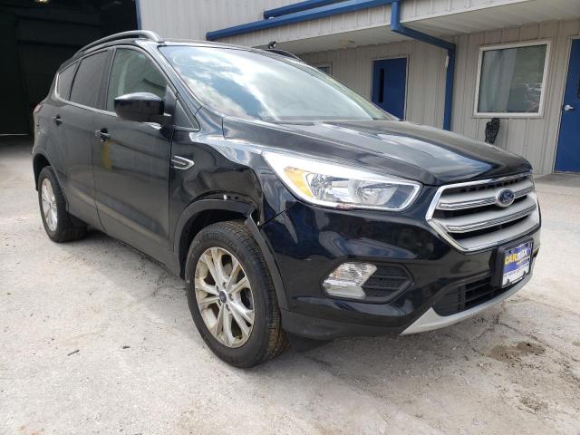 FORD ESCAPE SE 2018 with VIN 1FMCU0GD4JUD16498 - Photo from auction