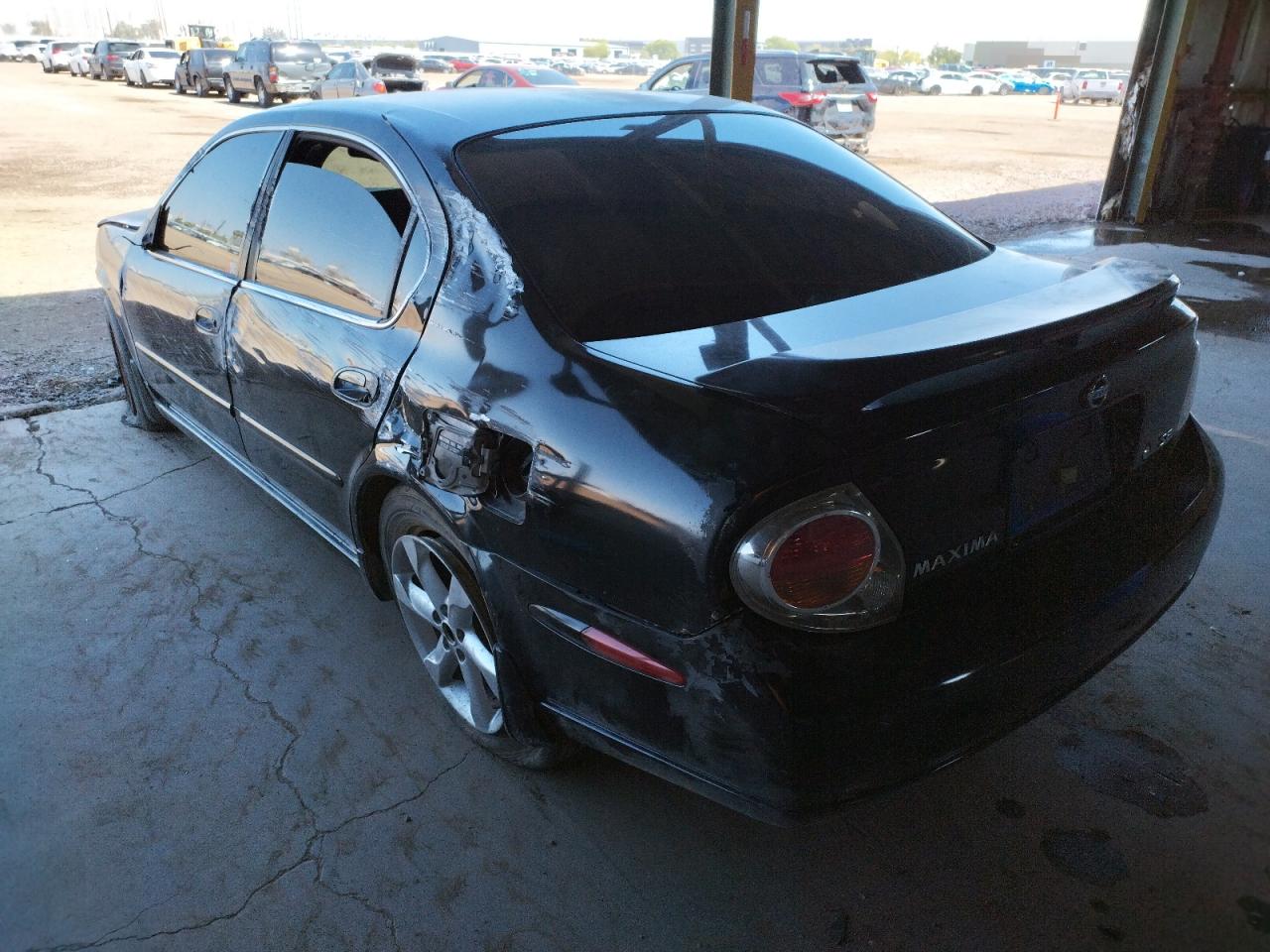 Photo 3 from auction – 2002 NISSAN MAXIMA GLE with VIN JN1DA31D42T419863