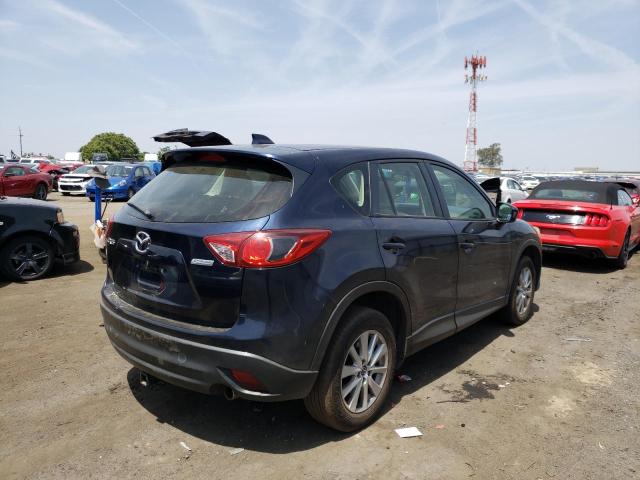Photo 4 from auction – 2014 MAZDA CX-5 SPORT with VIN JM3KE2BE7E0421596