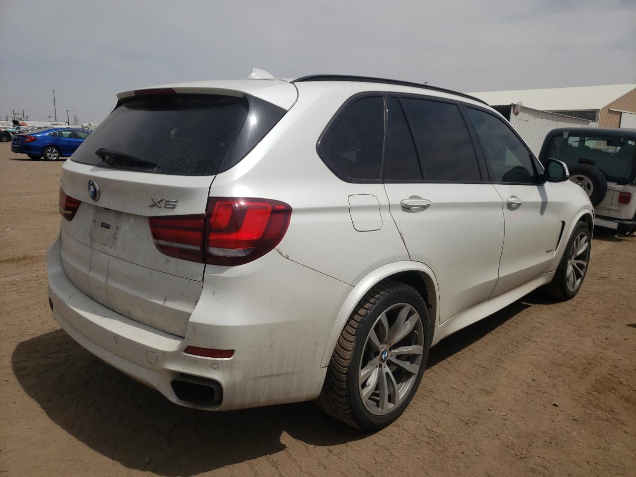 Photo 4 from auction – 2014 BMW X5 XDRIVE5 with VIN 5UXKR6C50E0J71619