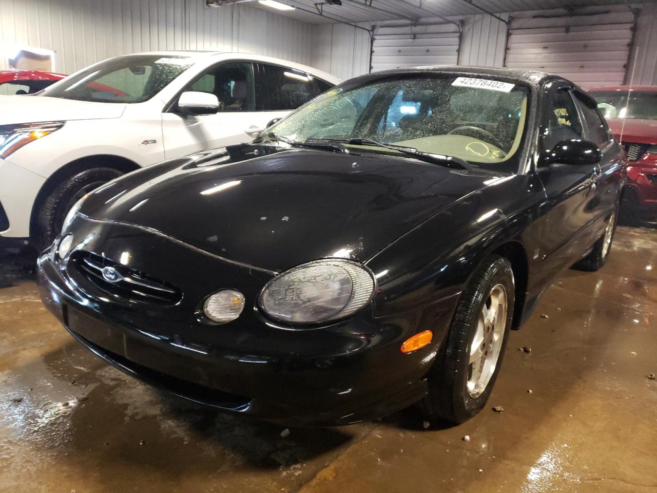 Photo 2 from auction – 1999 FORD TAURUS SE with VIN 1FAFP53S7XG248866