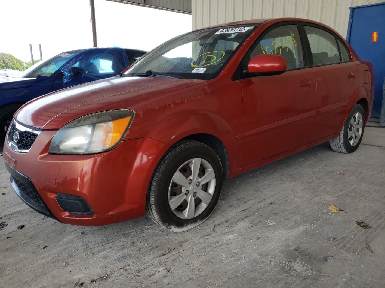 Photo 2 from auction – 2011 KIA RIO BASE with VIN KNADH4A30B6732121