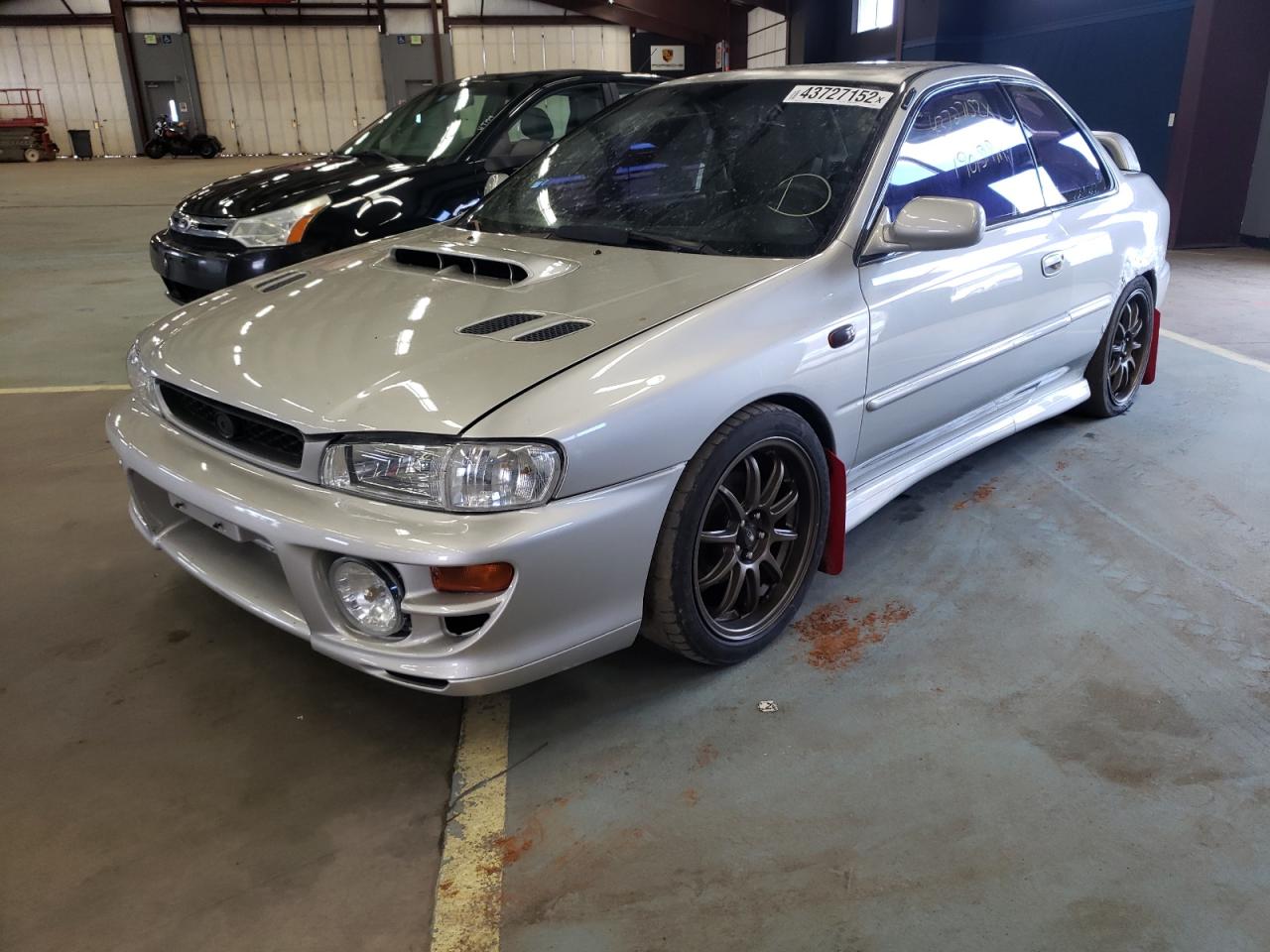Photo 2 from auction – 2000 SUBARU IMPREZA RS with VIN JF1GM6758YG402820