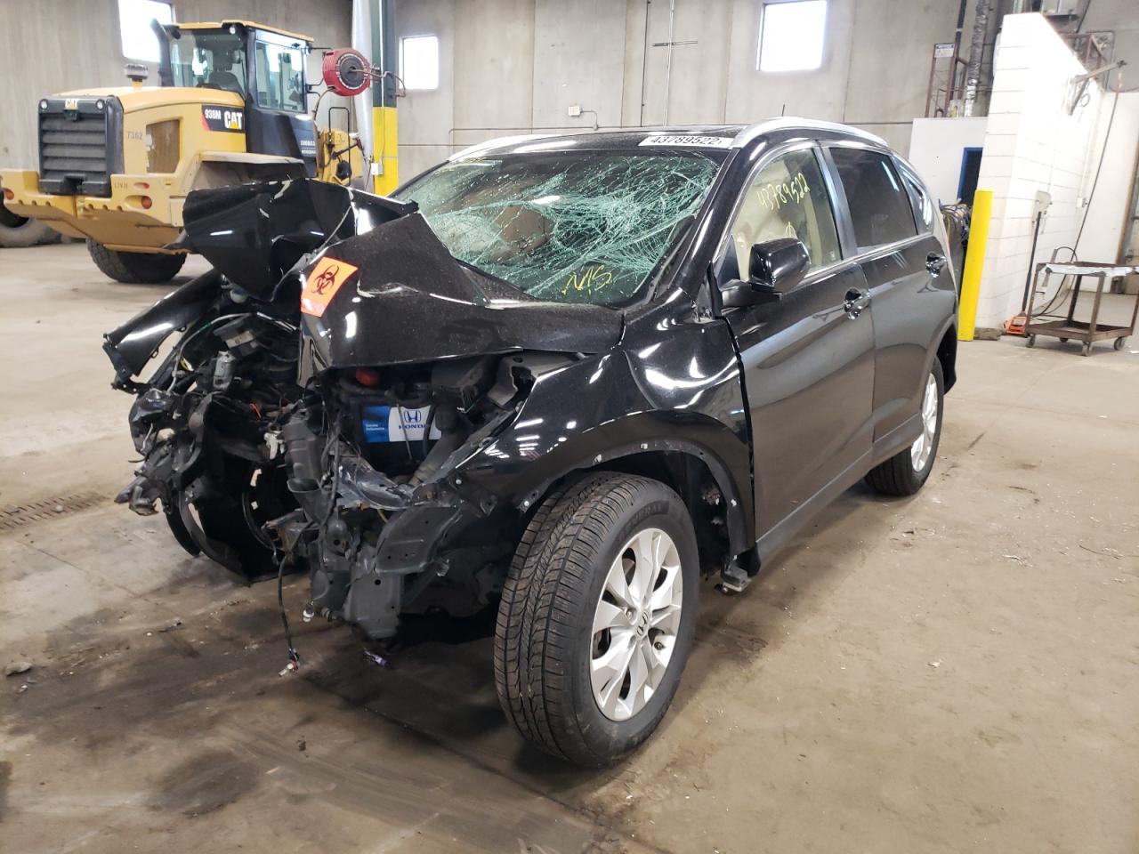 Photo 2 from auction – 2012 HONDA CR-V EXL with VIN JHLRM4H79CC016840