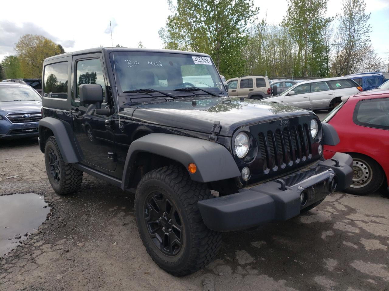 JEEP WRANGLER S 2015 with VIN 1C4AJWAG9FL646032 - Photo from auction